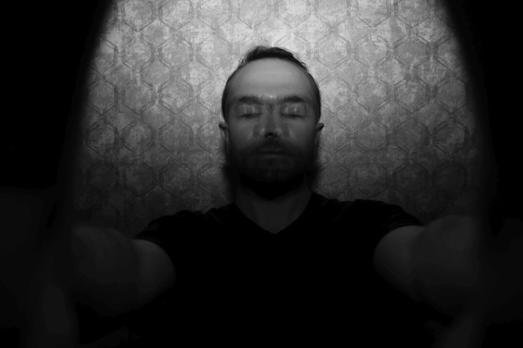 Portrait of a bearded man looking at the camera